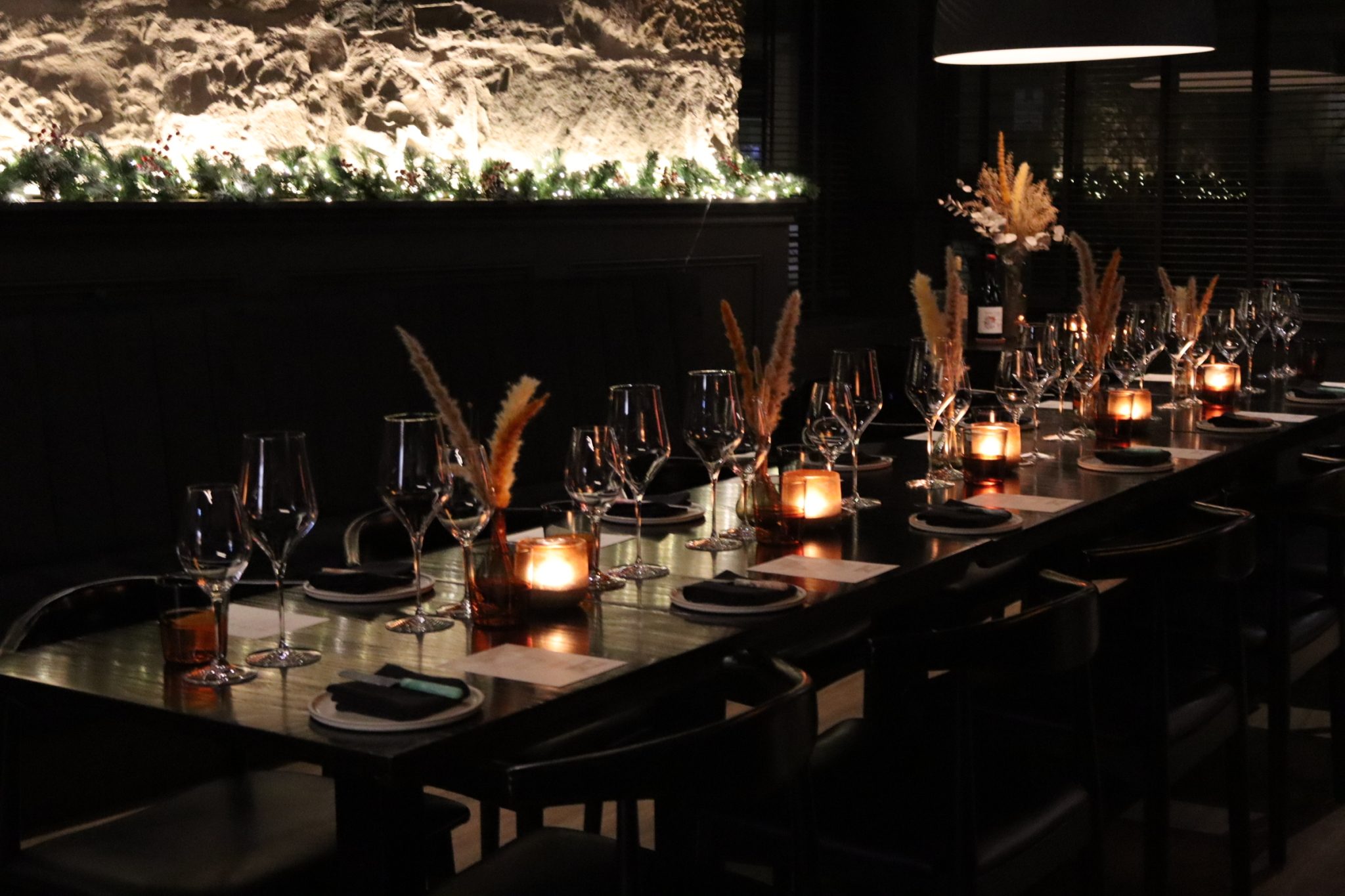 The private dining table set at Cardinal, Edinburgh, candlelight, glassware and seasonal florals